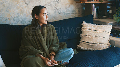 Buy stock photo Thinking, home and woman on sofa, sick and relax with contemplation in living room. Apartment, morning and person on couch, wonder and ponder with weekend break, calm and thoughtful with peace