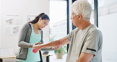 Buy stock photo Physiotherapy, dumbbell and consulting with old man in clinic for muscle healing, rehabilitation and injury. Physical therapy, osteoarthritis recovery and weights with senior patient and woman