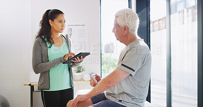 Buy stock photo Consulting, fitness or tablet with old man and physiotherapist in studio for rehabilitation. App, exercise or recovery with practitioner and senior patient in session for therapy or wellness