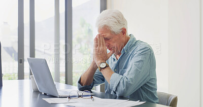 Buy stock photo Headache, stress and old man in house with laptop, glitch or worry in retirement funds. Mental health, tech and senior person at table with migraine, pressure or frustrated with pension investment.