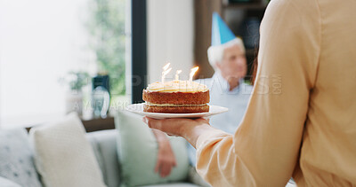Buy stock photo Home, birthday cake and people in lounge, candles and celebration with surprise. Apartment, social gathering and man with woman, sweet treat and party with snack, milestone and happy with dessert