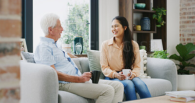 Buy stock photo Happy, coffee and daughter with old man on sofa for support, reunion and bonding. Retirement home, love and relax with senior father and woman in living room of apartment for family visit and tea