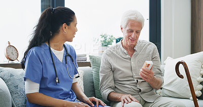 Buy stock photo Nurse, pills and reading with old man on sofa for medical treatment, support or consulting. Medicine, dosage and caregiver with senior patient and woman in living room of home for healthcare advice