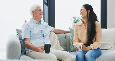 Buy stock photo Laugh, coffee and daughter with old man on sofa for support, reunion and bonding. Retirement home, love and joke with senior father and woman in living room of apartment for family visit and tea