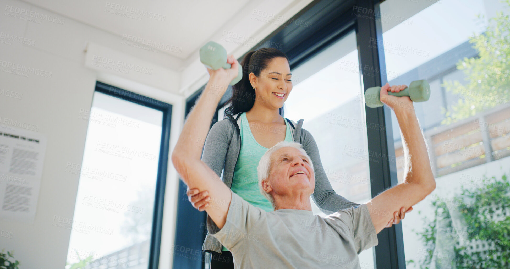 Buy stock photo Personal trainer, senior man or dumbbell to support physical health, strength training or workout. Retirement fitness, below or coach helping with weightlifting challenge, people or wellness exercise