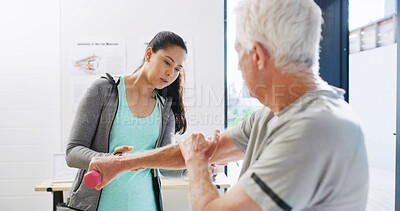 Buy stock photo Physiotherapy, dumbbell and advice with old man in clinic for muscle healing, rehabilitation and injury. Physical therapy, osteoarthritis recovery and weights with senior patient and woman in office