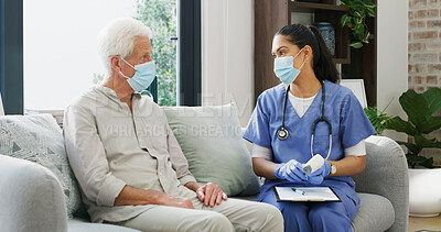 Buy stock photo Nurse, temperature and help with old man on sofa for medical treatment, support or consulting. Medicine, thermometer and caregiver with senior patient and woman in living room of home for advice