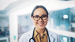 Portrait, doctor and woman with smile in office, medical services or healthcare career in cardiology. Professional, cardiac health or happy specialist with glasses in hospital, wellness or heart care
