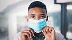 Portrait, doctor or black man in hospital with face mask for healthcare policy or protection from Covid. Medical professional, person or PPE for safety compliance, wellness and spread of coronavirus.