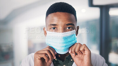 Buy stock photo Portrait, doctor or black man in hospital with face mask for healthcare policy or protection from infection. Medical professional, person or PPE for safety compliance, wellness and spread of disease.