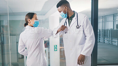 Buy stock photo Medical, face mask or people in clinic with elbow bump, greeting or regulation in virus protection. Healthcare, hello or doctor in hospital with gesture, Covid 19 or social distance in pandemic rules
