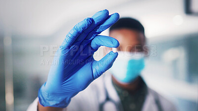Buy stock photo Hand, pill and doctor with medicine in hospital for cure, virus remedy and healthcare treatment. Glove, medical professional and person with drugs, prescription medication and mask with safety PPE