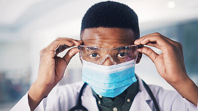 Buy stock photo Portrait, black man and doctor with glasses at hospital for eye protection, medical procedure and ppe. Surgeon, safety goggles and face mask to control disease, healthcare risk and hygiene compliance