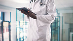 Tablet, man and hands of doctor in hospital with medical research for diagnosis or treatment plan. Digital technology, email and African male healthcare worker with online communication in clinic.