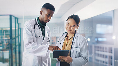 Buy stock photo Collaboration, pointing and tablet with doctors in hospital together for consulting or medicine. App, healthcare and results with people in clinic for assistance, conversation or medical diagnosis
