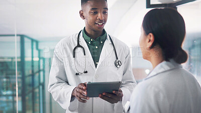 Buy stock photo Collaboration, tablet and talking with doctors in hospital together for medical consulting. App, conversation and healthcare with happy people in clinic for assistance, diagnosis or results feedback