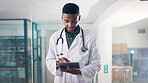 Tablet, black man and doctor in hospital with medical research for diagnosis or treatment plan. Digital technology, email and African male healthcare worker with online communication in clinic.