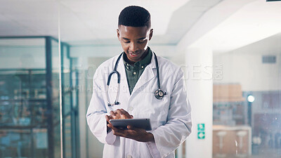Buy stock photo Tablet, black man and doctor in hospital with medical research for diagnosis or treatment plan. Digital technology, email and African male healthcare worker with online communication in clinic.