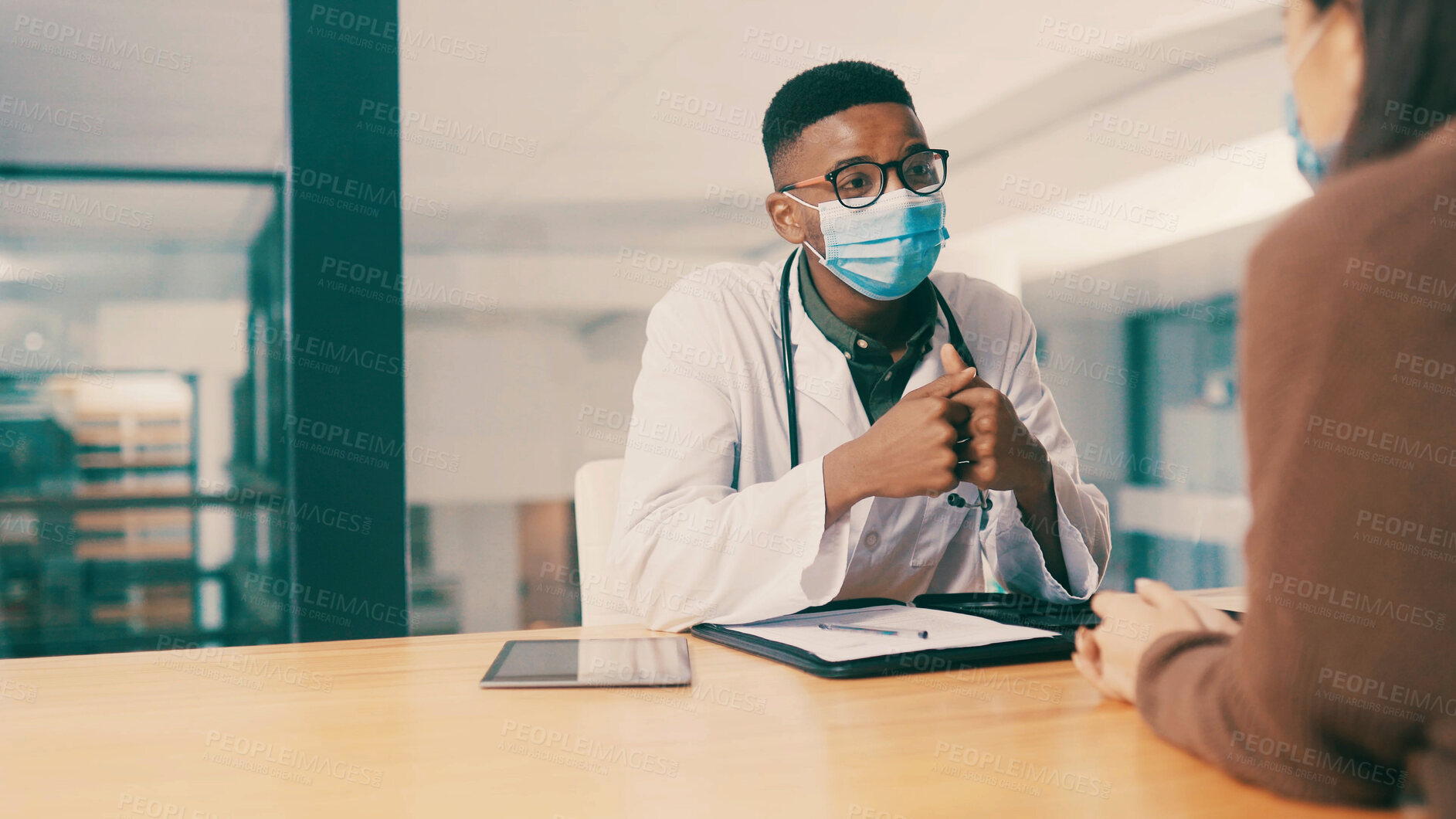 Buy stock photo Man, doctor and consultation with patient in clinic for healthcare feedback, help or results. Mask, medical professional and talk to woman in office for checkup, treatment plan and diagnosis update