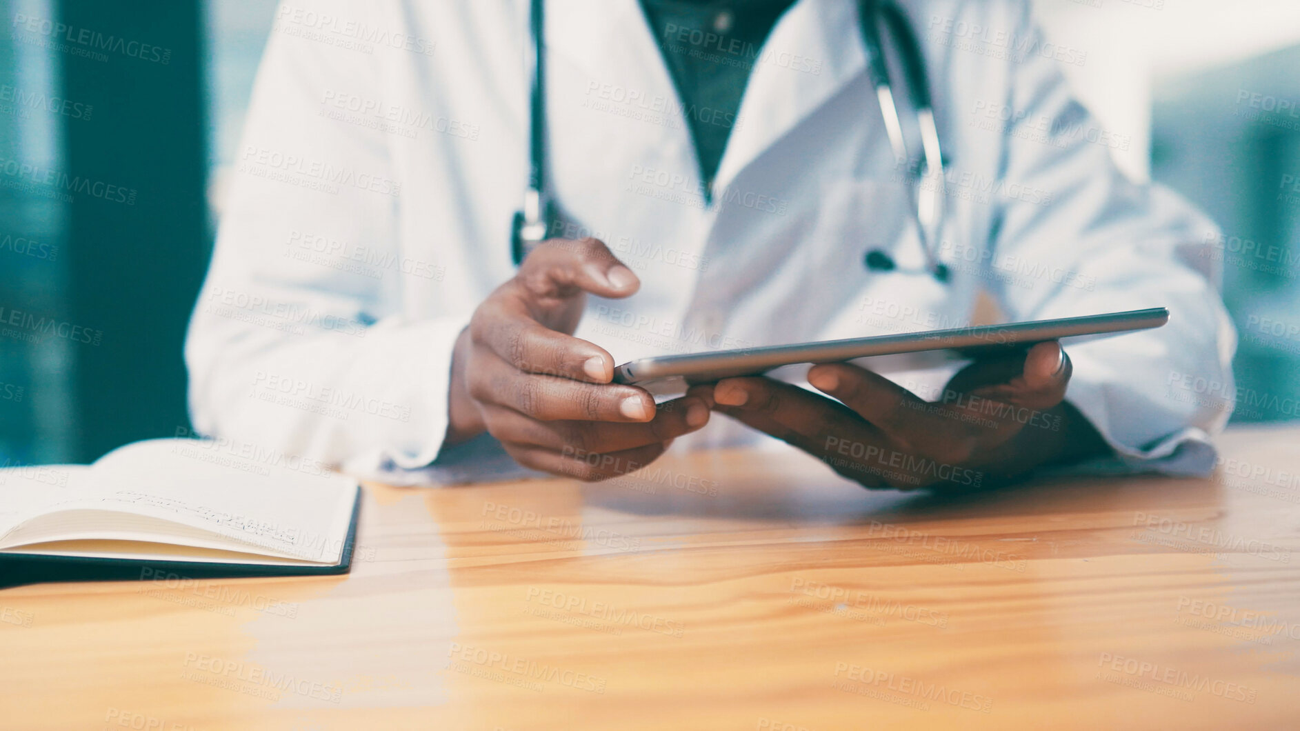 Buy stock photo Tablet, notebook and hands of doctor in clinic with medical research for treatment planning. Digital technology, information and African male healthcare worker with online diagnosis in hospital.