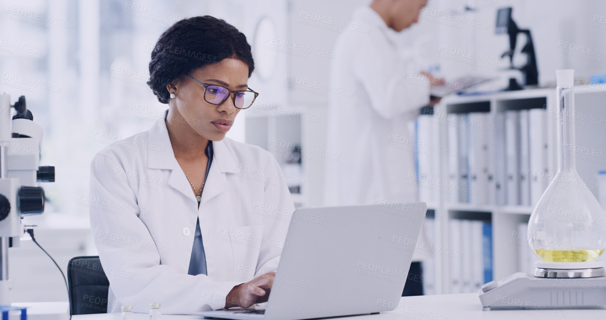 Buy stock photo Scientist, woman or research in lab with laptop for experiment results, medical innovation or review. Person, reading and computer with website for science development, pathology report and feedback.