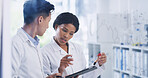 Chemistry, tablet and glass wall with people in lab for blood sample, vaccine formula and enzyme reaction. Medical research, digital report and brainstorming equation with scientists in clinic