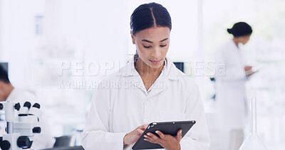 Buy stock photo Scientist, woman and reading with tablet in research lab, study biotech innovation or medical development. Healthcare advancement, trial results and person check pharma test, tech and medicine report