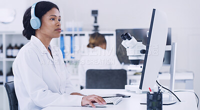 Buy stock photo Computer, headphones and science with woman in laboratory for medical research or pharmaceuticals. Healthcare, music and typing with scientist at desk for work on clinical trial or experiment