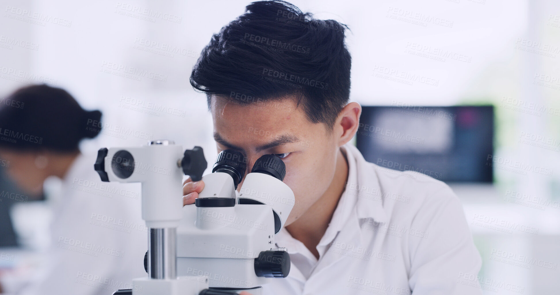 Buy stock photo Science, lab and man with sample in microscope for study, medical research and vaccine development. Chemistry, pharmaceutical and scientist with equipment for medicine, experiment and discovery