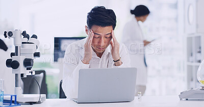 Buy stock photo Man, scientist or headache with laptop in laboratory for forensic research, fail or mistake. Male person, healthcare worker or science with stress on computer for strain, pressure or medical deadline