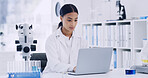 Laptop, woman and scientist in laboratory for project, medical research or healthcare innovation. Science, reading and female biologist with clinical trial for pharmaceutical development on computer.