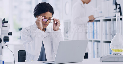 Buy stock photo Scientist, woman or glasses in lab with laptop for experiment results, medical innovation or review. Person, reading and research with computer for science development, pathology report and feedback.