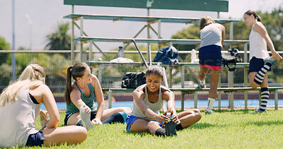 Buy stock photo Stretching, team and women on sports field, fitness and preparing for exercise routine and training. Outdoor, group and people with determination for competition, wellness and warm up for workout