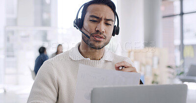 Buy stock photo Documents, headset and laptop with business man in coworking office for video call or webinar. Computer, paperwork and virtual meeting with employee in workplace for feedback, planning or review