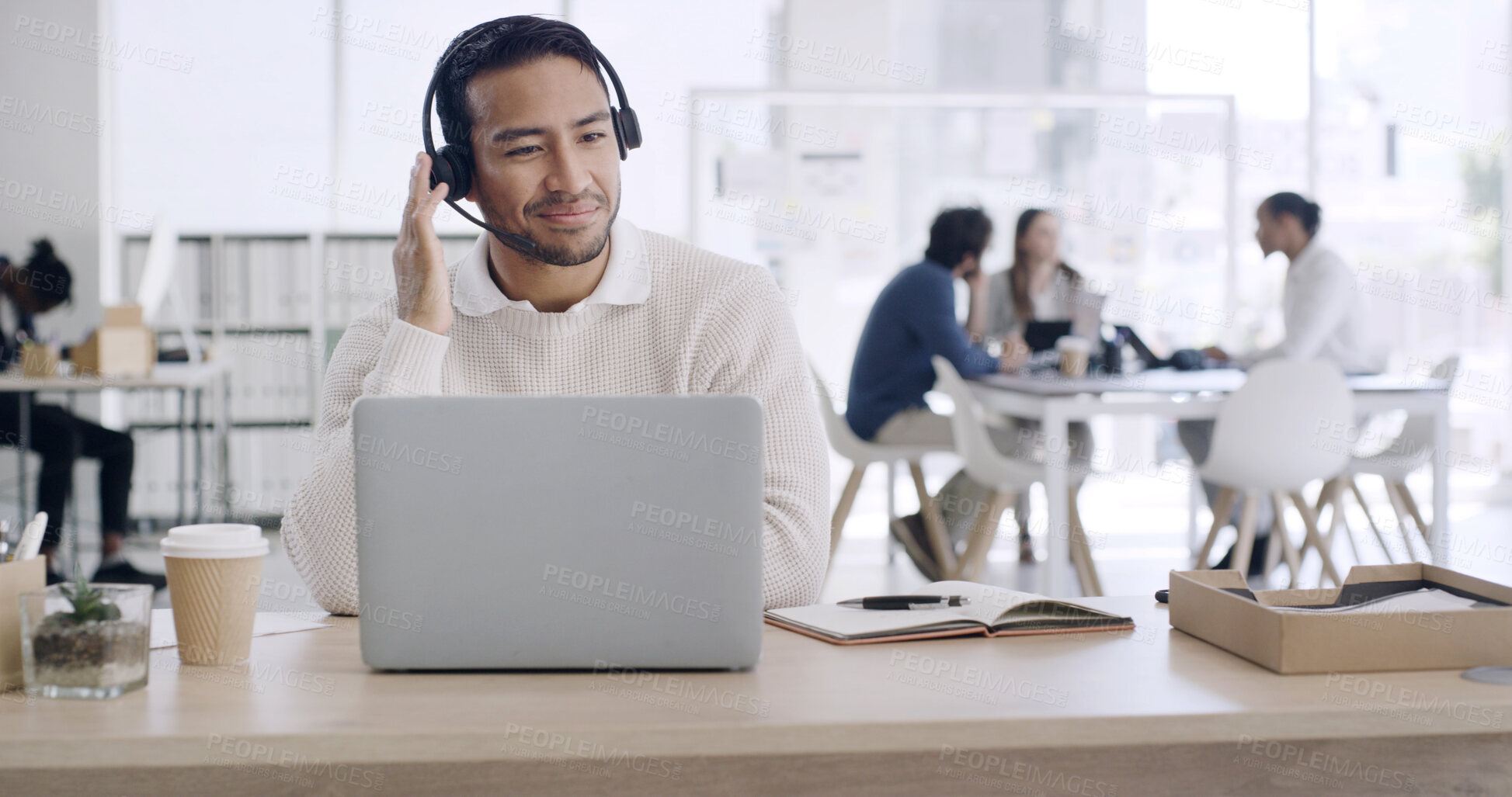Buy stock photo Headset, laptop and video call with business man in coworking office for development webinar. Computer, conversation and virtual meeting with employee in workplace for online discussion or planning