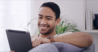 Buy stock photo Smile, man and relax with tablet at house for browsing website, social media and movie choice. Happy, person and digital for surfing internet, streaming film and entertainment subscription in lounge