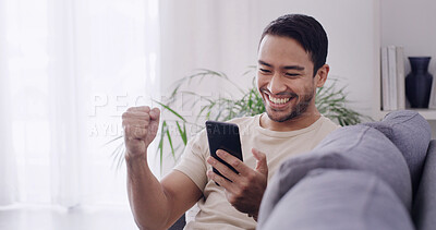 Buy stock photo Excited man, sofa and winning with phone in home for online deal, good news or lottery prize. Happy, male person or smile with mobile smartphone or fist pump on couch for investment or bonus in house