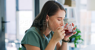 Buy stock photo Business woman, drinking and tea with glass in office for herbal beverage, remedy or cure. Female person, employee or antioxidant with chamomile for hydration, digestion or health and wellness