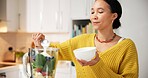 Kitchen, fruit and woman with blender for smoothie in morning for healthy drink, diet and detox. Home, protein shake and person with ingredients, yogurt and food for nutrition, wellness and vitamins