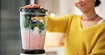 Smoothie, breakfast and hands with blender, kitchen and healthy drink for nutrition boost or protein. Vegetarian, wellness and person with liquid for gut health benefits, home and detox with beverage