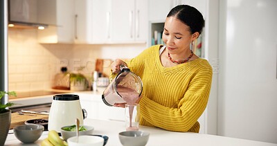 Buy stock photo Pouring, smoothie and woman with blender, kitchen and healthy drink for nutrition boost and protein. Vegetarian, wellness and person with liquid for gut health benefits, home and detox with beverage