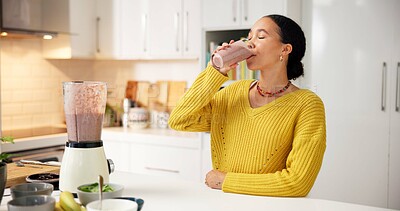 Buy stock photo Blender, woman and drinking smoothie in kitchen for breakfast shake, healthy gut and nutrition. Weight loss, person and meal replacement drink in house for detox, digestive health or protein benefits