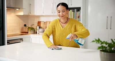 Buy stock photo Happy, woman and cleaning counter with spray for germ disinfection, dirt removal and housekeeping. Home, person and chemical product in kitchen for household maintenance, hygiene and domestic chores