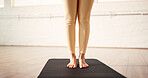 Fitness, pilates and legs of woman in studio for health, wellness or balance with workout in morning. Feet, yogi and female person with yoga exercise on mat for flexibility with posture in gym.