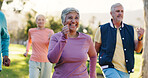 Group, senior woman and exercise at park for retirement fitness, mobility or cardio workout. Elderly club, instructor and physical activity in nature for muscle strength, health benefits and wellness