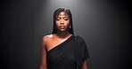 Runway, black woman and portrait of model at fashion show for clothing brand, collection or label launch. Serious, elegant and female person on catwalk for designer line with stylish outfit at event.