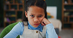 Bored, portrait and child in bedroom with homework, annoyed or tired of problem solving at home. Angry, learner and girl in house with pout, school burnout and moody in homeschool assignment.