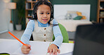 Homework, girl and kid with books, laptop and writing with online class, education and headphones. Apartment, childhood and student with pc, notebook and internet with virtual meeting and development