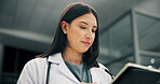 Doctor, tablet and woman in hospital for healthcare research,  report or schedule in clinic at night. Tech, medical worker or serious person with online results, check email or telehealth on overtime