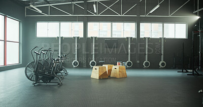 Buy stock photo Interior, equipment and bicycle in empty gym for fitness, spin class and sports training. Setup, stationary bike and machine for endurance exercise, workout challenge and cardio in wellness facility